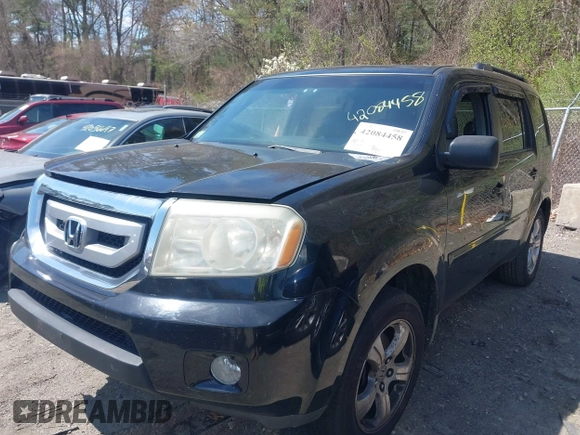 2009 Honda Pilot EX-L with VIN 5FNYF48579B007700, listed as a IAAI auction lot 42084458 with 208,104 mi miles. Bid and sale history available at carsss.com. Image 2.
