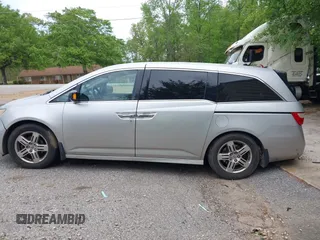 2012 Honda Odyssey Touring with VIN 5FNRL5H95CB101605, listed as a IAAI auction lot 42025163 with 286,421 mi miles. Bid and sale history available at carsss.com. Image 15.