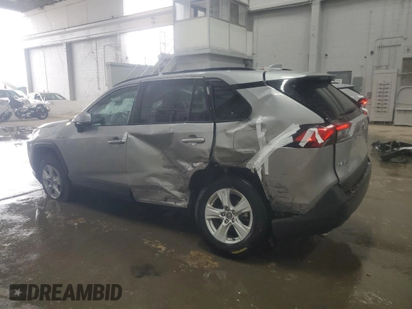 2020 Toyota RAV4 Hybrid XLE with VIN 2T3R6RFV1LW001235, listed as a Copart auction lot 56818635 with 105,234 mi miles and Salvage title. Bid and sale history available at DreamBid. Image 2.