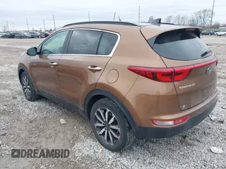 2019 Kia Sportage EX with VIN KNDPNCAC6K7532230, listed as a IAAI auction lot 41516933 with 98,819 mi miles. Bid and sale history available at carsss.com. Image 3.