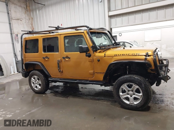 2014 Jeep Wrangler Unlimited Rubicon with VIN 1C4BJWFG7EL254534, listed as a IAAI auction lot 41279731 with 140,218 mi miles. Bid and sale history available at carsss.com. Image 13.