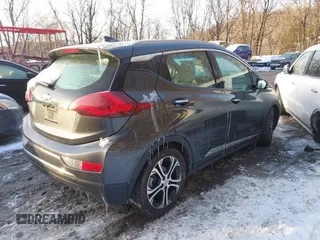 2021 Chevrolet Bolt EV Premier z VIN 1G1FZ6S09M4113694, wystawiony jako IAAI lot #41378289 z przebiegiem 40 979 mil mil oraz . Historia ofert i sprzedaży dostępna na DreamBid. Obrazek 4.