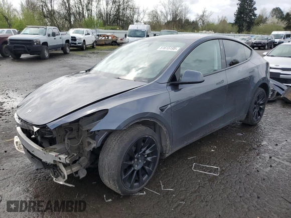 2023 Tesla Model Y Long Range z VIN 7SAYGDEE1PF937867, wystawiony jako Copart lot #51615195 z przebiegiem 88 912 mil mil oraz Szkoda całkowita • Salvage title. Historia ofert i sprzedaży dostępna na DreamBid. Obrazek 1.