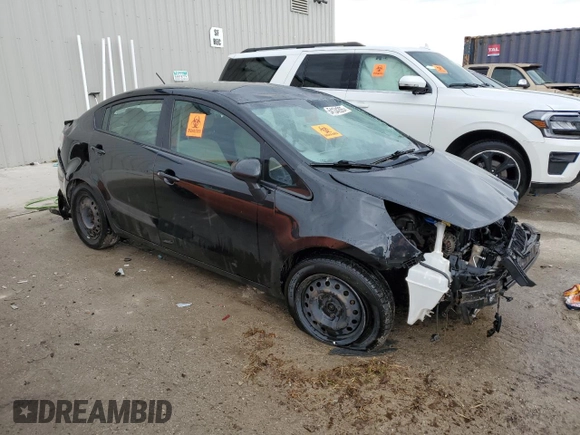 2015 Kia Rio LX with VIN KNADM4A3XF6440784, listed as a Copart auction lot 54134205 with 158,035 mi miles and Non Repairable. Bid and sale history available at carsss.com. Image 4.