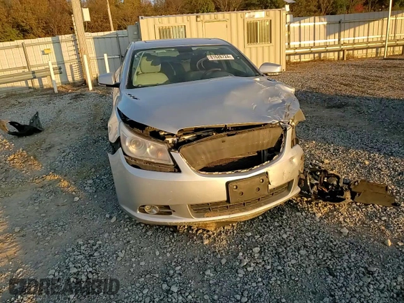 2012 Buick LaCrosse Touring с VIN 1G4GJ5E35CF131532, выставлен на аукционе Copart как лот 81626724 с пробегом 163 571 миль миль и Списание • Salvage title. История ставок и продаж доступна на DreamBid. Изображение 11.
