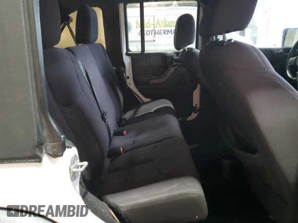 2013 Jeep Wrangler Unlimited Sport z VIN 1C4BJWDGXDL632315, wystawiony jako Copart lot #66711564 z przebiegiem 131 907 mil mil oraz Tytuł czysty. Historia ofert i sprzedaży dostępna na DreamBid. Obrazek 11.
