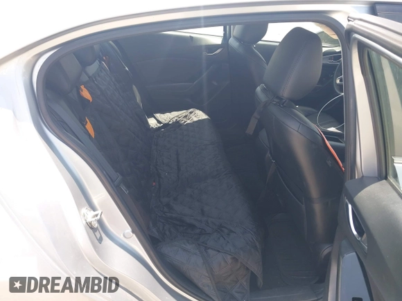 2018 Mazda 3 Touring z VIN 3MZBN1V35JM272638, wystawiony jako IAAI lot #42458722 z przebiegiem 98 393 mil mil oraz . Historia ofert i sprzedaży dostępna na DreamBid. Obrazek 8.