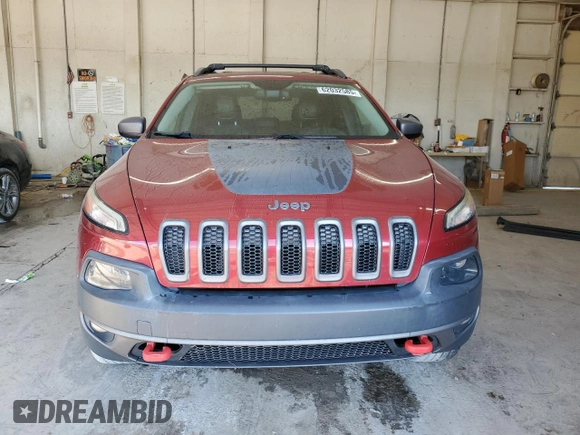 2015 Jeep Cherokee Trailhawk with VIN 1C4PJMBS1FW745928, listed as a Copart auction lot 62032585 with 132,559 mi miles and Salvage title. Bid and sale history available at DreamBid. Image 5.