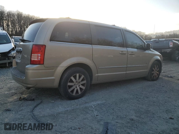 2009 Chrysler Town & Country Touring with VIN 2A8HR54X49R653052, listed as a Copart auction lot 48133155 with 151,527 mi miles and Salvage Title. Bid and sale history available at DreamBid. Image 3.