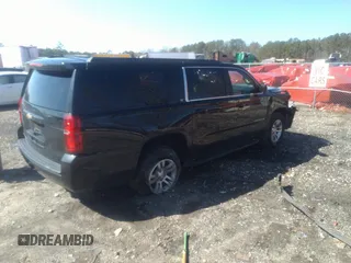 2019 Chevrolet Suburban LT with VIN 1GNSCHKCXKR405939, listed as a IAAI auction lot 41591475 with 106,554 mi miles and . Bid and sale history available at DreamBid. Image 4.