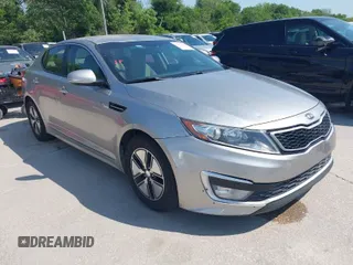 2013 Kia Optima Hybrid EX with VIN KNAGM4AD8D5059623, listed as a IAAI auction lot 42052998 with 135,051 mi miles. Bid and sale history available at carsss.com. Image 1.