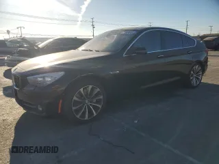 2016 BMW 5 Series GT 535i with VIN WBA5M2C58GG499092, listed as a Copart auction lot 77889944 with 80,329 mi miles and Salvage Title. Bid and sale history available at carsss.com. Image 1.