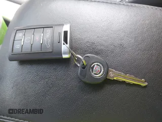 2014 Cadillac SRX Performance Collection с VIN 3GYFNFE38ES656510, выставлен на аукционе IAAI как лот 42336472 с пробегом 125 269 миль миль и . История ставок и продаж доступна на DreamBid. Изображение 11.