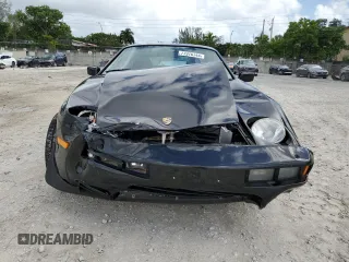 1985 Porsche 928 z VIN WP0JB0921FS861994, wystawiony jako Copart lot #77976744 z przebiegiem 65 048 mil mil oraz Nie do naprawy. Historia ofert i sprzedaży dostępna na DreamBid. Obrazek 5.