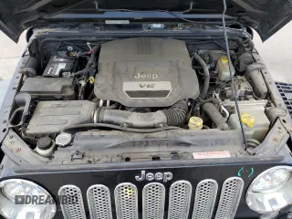 2014 Jeep Wrangler Sport with VIN 1C4AJWAG8EL159953, listed as a Copart auction lot 61175035 with 137,480 mi miles and Salvage title. Bid and sale history available at DreamBid. Image 12.