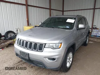 2018 Jeep Grand Cherokee Laredo E with VIN 1C4RJEAG1JC275356, listed as a IAAI auction lot 42150422 with 69,720 mi miles and . Bid and sale history available at DreamBid. Image 17.