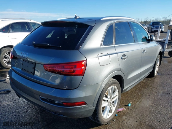 2016 Audi Q3 Premium Plus with VIN WA1BFCFSXGR014778, listed as a IAAI auction lot 41285863 with 73,044 mi miles. Bid and sale history available at carsss.com. Image 4.