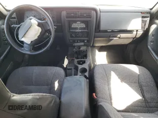 1999 Jeep Cherokee Sport with VIN 1J4FT68S9XL627003, listed as a Copart auction lot 49478595 with 320,444 mi miles and Salvage title. Bid and sale history available at DreamBid. Image 8.
