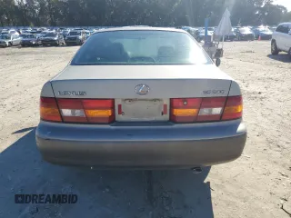 1997 Lexus ES 300 Luxury Sport Sdn with VIN JT8BF22G9V0025028, listed as a Copart auction lot 88229995 with 0 mi miles and Salvage Title. Bid and sale history available at carsss.com. Image 6.