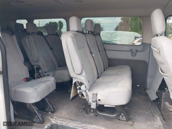 2019 Ford Transit Passenger Wagon XL with VIN 1FBZX2YM5KKA48112, listed as a IAAI auction lot 41518013 with 163,856 mi miles. Bid and sale history available at carsss.com. Image 8.