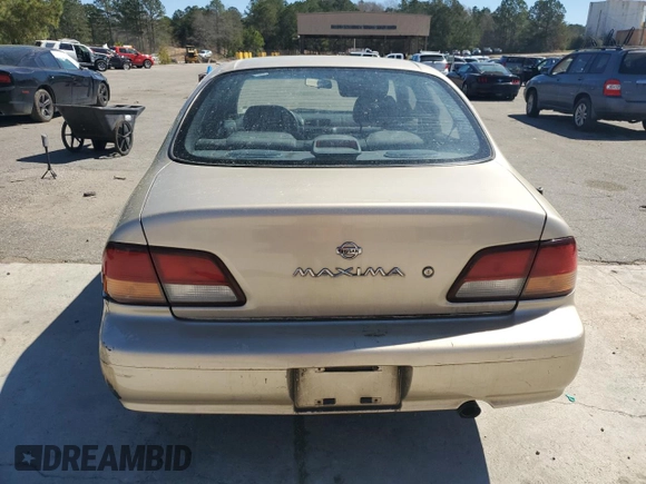 1997 Nissan Maxima GXE z VIN JN1CA21DXVT877062, wystawiony jako Copart lot #49411185 z przebiegiem 249 941 mil mil oraz Szkoda całkowita • Salvage title. Historia ofert i sprzedaży dostępna na DreamBid. Obrazek 6.