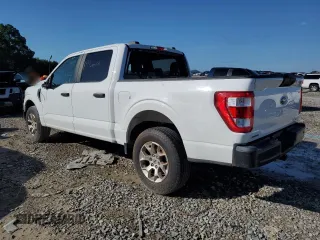 2021 Ford F-150 with VIN 1FTFW1P80MKE71179, listed as a Copart auction lot 64691115 with 57,413 mi miles and Salvage title. Bid and sale history available at DreamBid. Image 2.