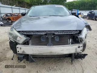 2016 Nissan Maxima SL with VIN 1N4AA6AP0GC379967, listed as a Copart auction lot 60839615 with 107,201 mi miles and Salvage title. Bid and sale history available at DreamBid. Image 5.