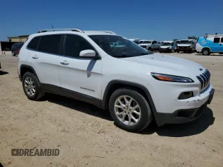 2015 Jeep Cherokee Latitude with VIN 1C4PJLCSXFW643701, listed as a Copart auction lot 51322805 with 67,415 mi miles and Salvage Title. Bid and sale history available at carsss.com. Image 4.