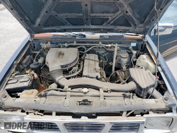 1994 Nissan Frontier with VIN 1N6SD11S2RC341136, listed as a Copart auction lot 57107995 with 174,479 mi miles and Salvage title. Bid and sale history available at DreamBid. Image 11.