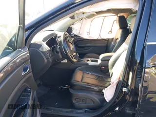 2015 Cadillac SRX z VIN 3GYFNAE32FS543933, wystawiony jako IAAI lot #41578338 z przebiegiem 150 937 mil mil oraz . Historia ofert i sprzedaży dostępna na DreamBid. Obrazek 5.