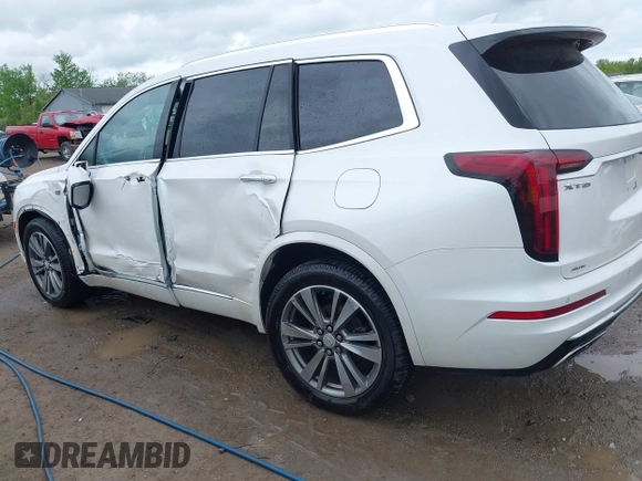 2021 Cadillac XT6 Premium Luxury z VIN 1GYKPDRS0MZ141453, wystawiony jako IAAI lot #42215954 z przebiegiem 144 245 mil mil oraz . Historia ofert i sprzedaży dostępna na DreamBid. Obrazek 15.