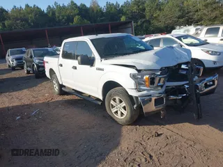 2018 Ford F-150 XL with VIN 1FTEW1E55JKF29898, listed as a IAAI auction lot 40593129 with 158,663 mi miles and . Bid and sale history available at carsss.com. Image 1.