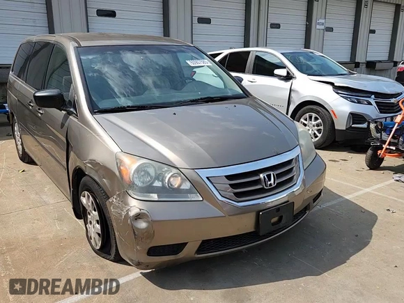 2008 Honda Odyssey LX z VIN 5FNRL38218B052952, wystawiony jako Copart lot #60907585 z przebiegiem 82 876 mil mil oraz Szkoda całkowita • Salvage title. Historia ofert i sprzedaży dostępna na DreamBid. Obrazek 14.