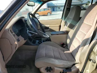 2000 Ford Explorer XLT with VIN 1FMZU73X6YZC45028, listed as a Copart auction lot 75051274 with 209,804 mi miles and Salvage Title. Bid and sale history available at DreamBid. Image 7.