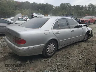 2001 Mercedes-Benz E-Class with VIN WDBJF65J71B201020, listed as a Copart auction lot 76067154 with 328,629 mi miles and Salvage Title. Bid and sale history available at carsss.com. Image 3.