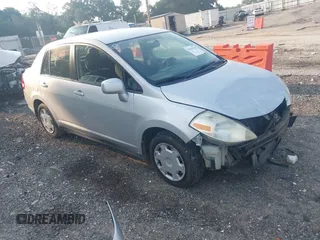 2009 Nissan Versa S with VIN 3N1BC11EX9L386543, listed as a IAAI auction lot 42355700 with 253,954 mi miles and . Bid and sale history available at DreamBid. Image 1.