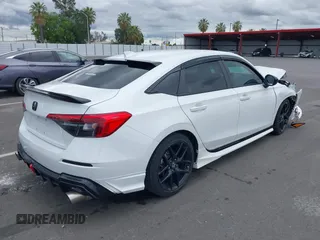 2023 Honda Civic Sport z VIN 2HGFE2F52PH551175, wystawiony jako IAAI lot #42251314 z przebiegiem 23 419 mil mil oraz . Historia ofert i sprzedaży dostępna na DreamBid. Obrazek 4.