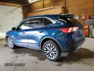 2020 Ford Escape Titanium Hybrid с VIN 1FMCU9DZ3LUB58677, выставлен на аукционе Copart как лот 54164465 с пробегом 32 115 миль миль и Списание • Salvage title. История ставок и продаж доступна на DreamBid. Изображение 2.