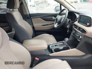 2019 Hyundai Santa Fe SE z VIN 5NMS2CADXKH005960, wystawiony jako IAAI lot #42341142 z przebiegiem 71 617 mil mil oraz . Historia ofert i sprzedaży dostępna na DreamBid. Obrazek 5.
