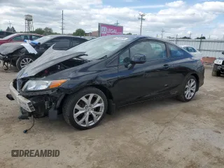 2012 Honda Civic Cpe Si with VIN 2HGFG4A52CH701261, listed as a Copart auction lot 68103234 with 105,686 mi miles and Salvage Title. Bid and sale history available at carsss.com. Image 1.