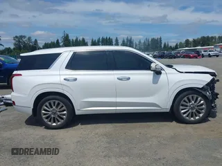 2020 Hyundai Palisade Limited with VIN KM8R5DHE9LU074994, listed as a IAAI auction lot 42596378 with 71,726 mi miles and . Bid and sale history available at DreamBid. Image 14.