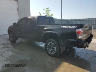 2022 Toyota Tacoma SR5 with VIN 3TYDZ5BN5NT013509, listed as a Copart auction lot 63307255 with 34,039 mi miles and Salvage title. Bid and sale history available at DreamBid. Image 2.