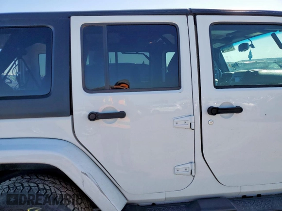 2017 Jeep Wrangler Unlimited Sahara with VIN 1C4BJWEG3HL665774, listed as a Copart auction lot 48538105 with 98,676 mi miles and Salvage Title. Bid and sale history available at carsss.com. Image 11.