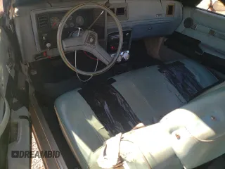 1979 Chevrolet Monte Carlo z VIN 1Z37H9D520488, wystawiony jako Copart lot #77283914 z przebiegiem 49 514 mil mil oraz Tytuł czysty. Historia ofert i sprzedaży dostępna na DreamBid. Obrazek 8.