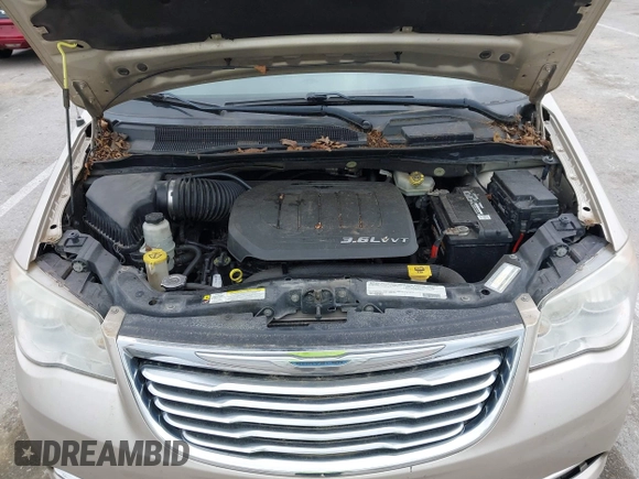 2012 Chrysler Town & Country Touring-L with VIN 2C4RC1CG3CR368471, listed as a IAAI auction lot 42045154 with 212,696 mi miles. Bid and sale history available at carsss.com. Image 10.