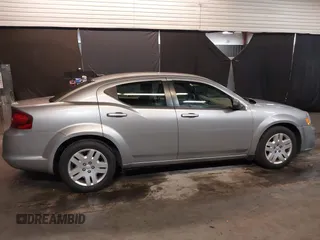 2014 Dodge Avenger SE with VIN 1C3CDZAB5EN228953, listed as a IAAI auction lot 41898027 with 33,731 mi miles. Bid and sale history available at carsss.com. Image 14.