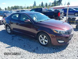 2015 Kia Optima LX with VIN 5XXGM4A71FG438717, listed as a IAAI auction lot 42712998 with 111,764 mi miles and . Bid and sale history available at DreamBid. Image 1.