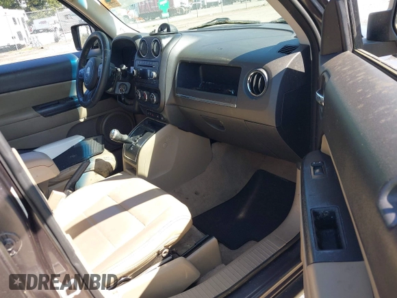 2014 Jeep Patriot Latitude with VIN 1C4NJPFA5ED928074, listed as a IAAI auction lot 42035754 with 155,636 mi miles and . Bid and sale history available at carsss.com. Image 5.