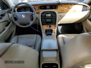 2008 Jaguar XJ with VIN SAJWA79BX8SH23430, listed as a Copart auction lot 51990785 with 140,454 mi miles and Salvage Title. Bid and sale history available at carsss.com. Image 8.