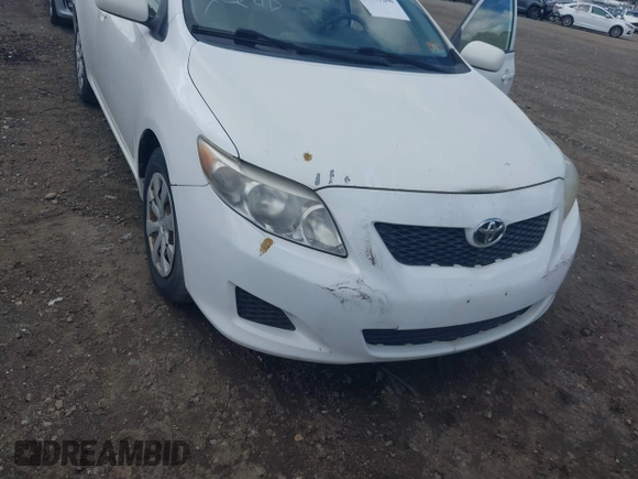2009 Toyota Corolla with VIN JTDBL40E199019510, listed as a IAAI auction lot 40471286 with 99,818 mi miles and . Bid and sale history available at carsss.com. Image 6.